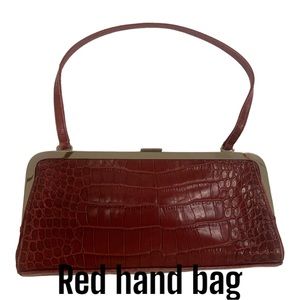 Red embossed hand bag/clutch , great for the holidays.